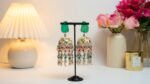 Handcrafted Green Floral Enamel Meenakari Jhumka with Pearl and Bead Details