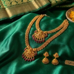 Royal Long Necklace With Lakshmi Pendent and Red Pearl Plus Earrings