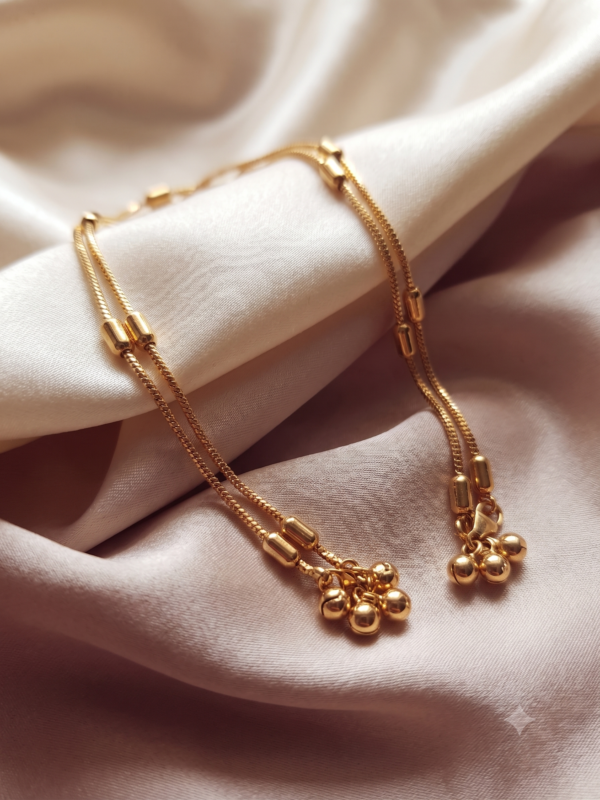 Golden rhythm anklet cylindrical bead Impon Panchaloha - SunShoppers UK