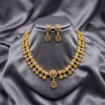 Gold-tone floral cluster necklace set with white stone detailing – SunShoppers UK