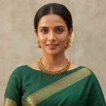 Antique gold-tone beaded drop necklace with textured scroll detailing and matching jhumka earring