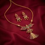 Gold-tone eagle pendant necklace set with tassel closure – SunShoppers UK