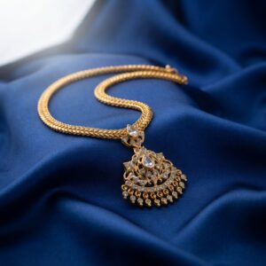 Gold-tone Chandbali pendant necklace with white stone detailing – SunShoppers UK