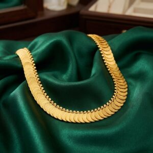 Gold-tone single row Kasu coin necklace on display bust – SunShoppers UK