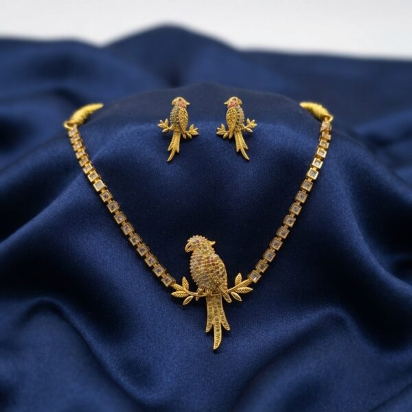 Gold-tone parrot motif pendant necklace set with studded chain – SunShoppers UK