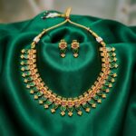 Gold-tone ruby-red stone necklace set with green enamel drops – SunShoppers UK