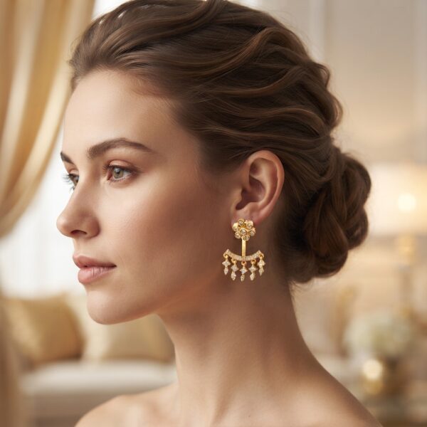 Gold-tone ear jacket earrings with cubic zirconia flower studs and fringe drops