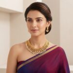 Gold-tone faux pearl necklace set with collar-style coiled band, ruby-coloured teardrop motifs and matching drop earrings