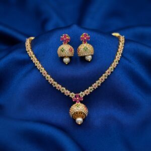 jhumka pendant necklace set with pearl-style drop and matching jhumka earrings