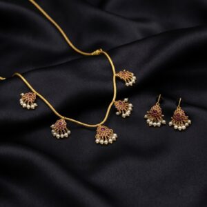 floral charm necklace set with pearl-style drops and hook earrings
