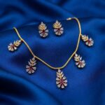 leaf charm necklace set with matching stud earrings