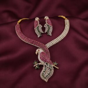 gold-tone parrot necklace set with American diamond-style detail and matching parrot earrings