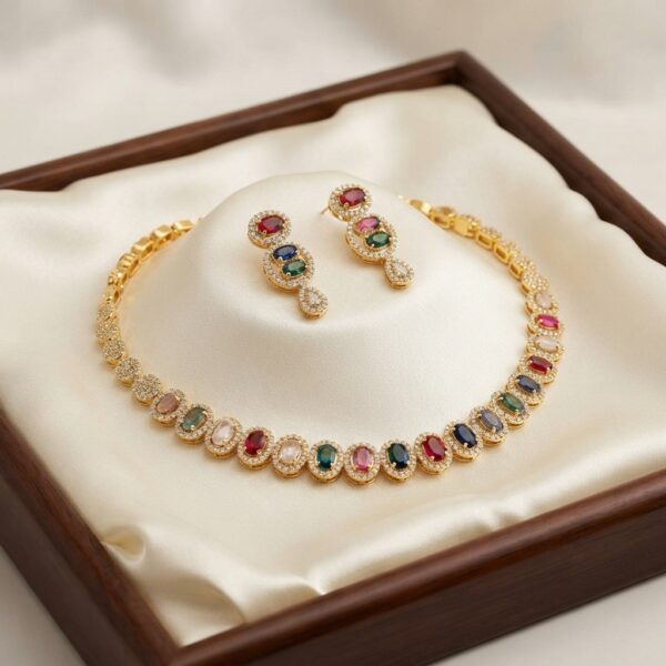 Gold-tone multicolour necklace set with oval coloured stones, cubic zirconia halos and matching drop earrings in a gift box