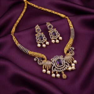 elephant necklace set with pearl-style drops and matching chandelier earrings