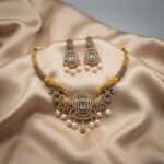 elephant necklace set with pearl-style drops and matching chandelier earrings