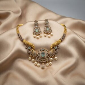 elephant necklace set with pearl-style drops and matching chandelier earrings