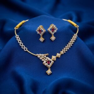 asymmetric necklace set with leaf pendant and matching drop earrings