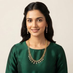 Gold-tone fringe long necklace set with cubic zirconia loop motifs, flower charm drops and matching drop earrings
