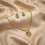 fan pendant necklace set with American diamond-style halo and matching stud earrings