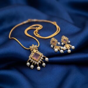 gold-tone pearl drop pendant necklace set with square stone-style centre and matching earrings