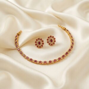 simple gold-tone Indian necklace set with floral stud earrings
