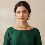 Antique gold-tone twin elephant choker necklace set with kundan-style stones and matching floral pearl-style drop earrings