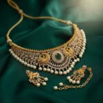 peacock choker necklace set with pearl-style drops and matching earrings