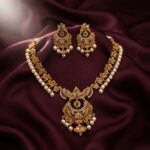 Multicolour antique gold-tone chandbali necklace set with crescent pendant, pearl-style drops and matching chandbali earrings