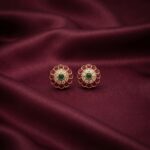 gold-tone floral stud earrings with American diamond-style halo and round centre stone
