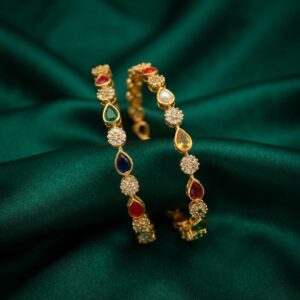 Pair of gold-tone multicolour teardrop bangles with AD-style stone clusters